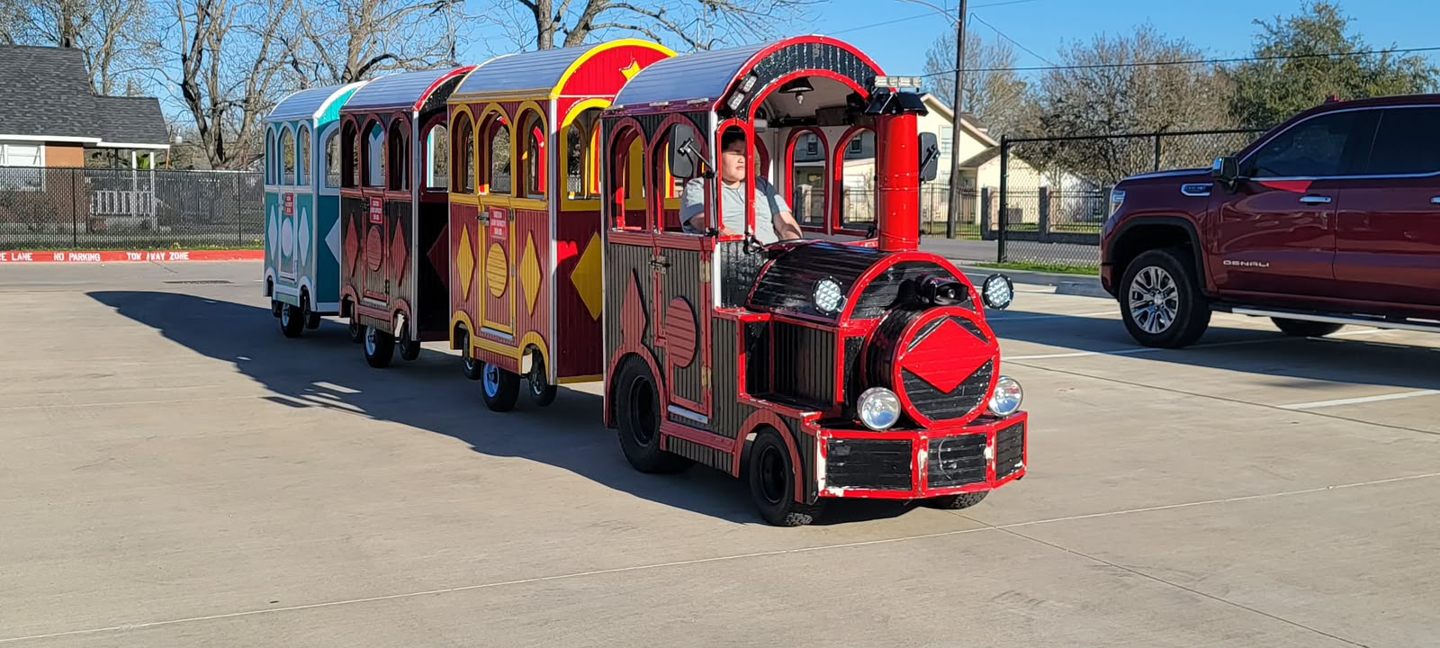 Colorful trackless party train in Houston